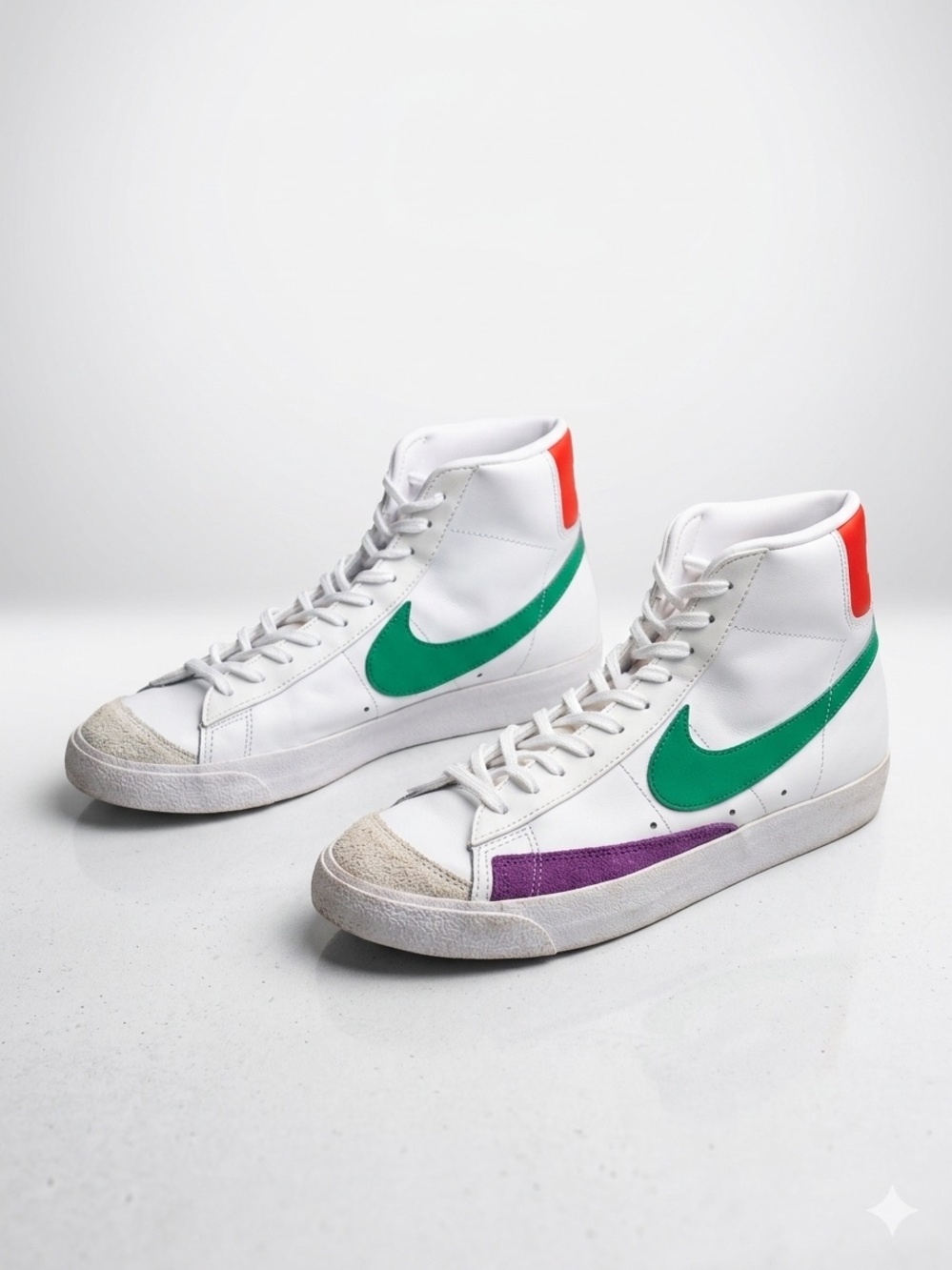 Nike White High-Top Sneakers with Green Swoosh, Purple and Red Accents